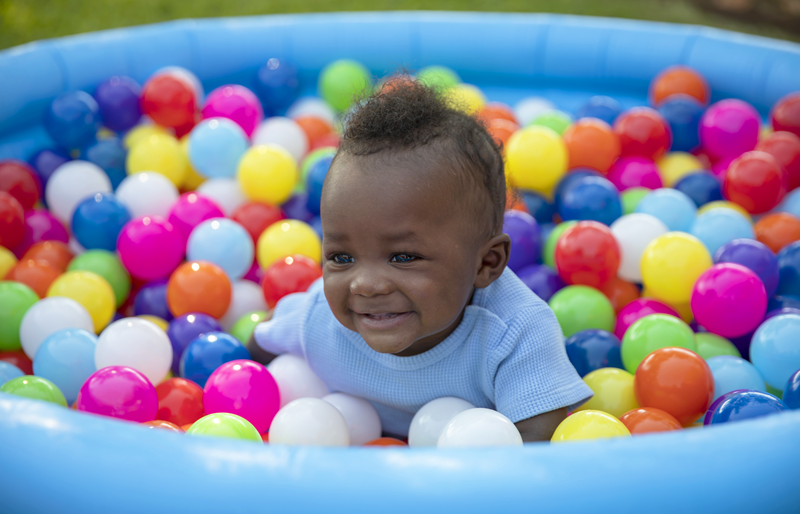 Cute kid in ball pit