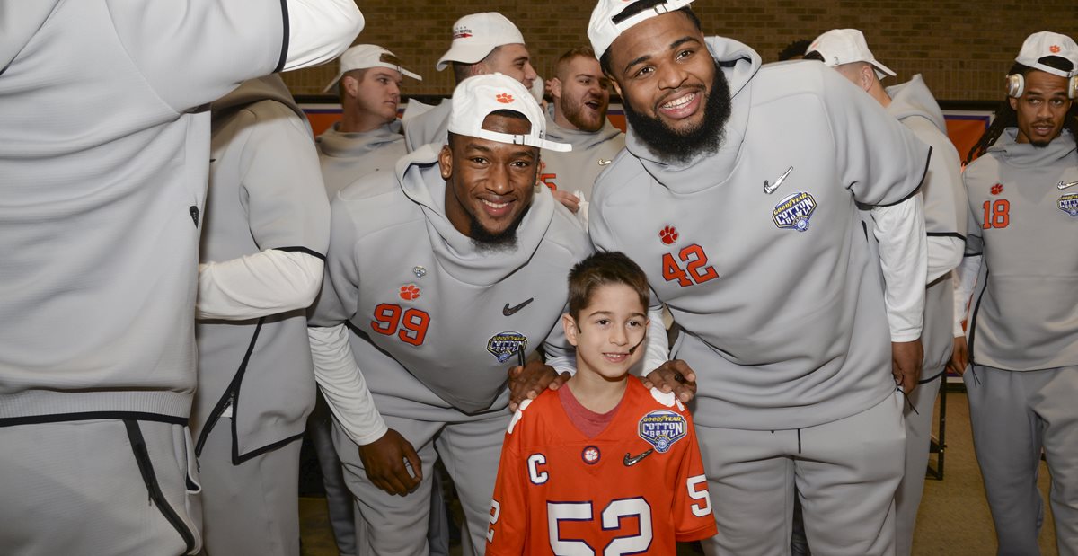 Layton Horner with Clemson football players