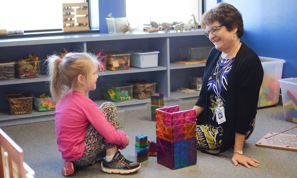 Child and doctor at Dyslexia Educator Center at Texas Scottish Rite Hospital for Children 
