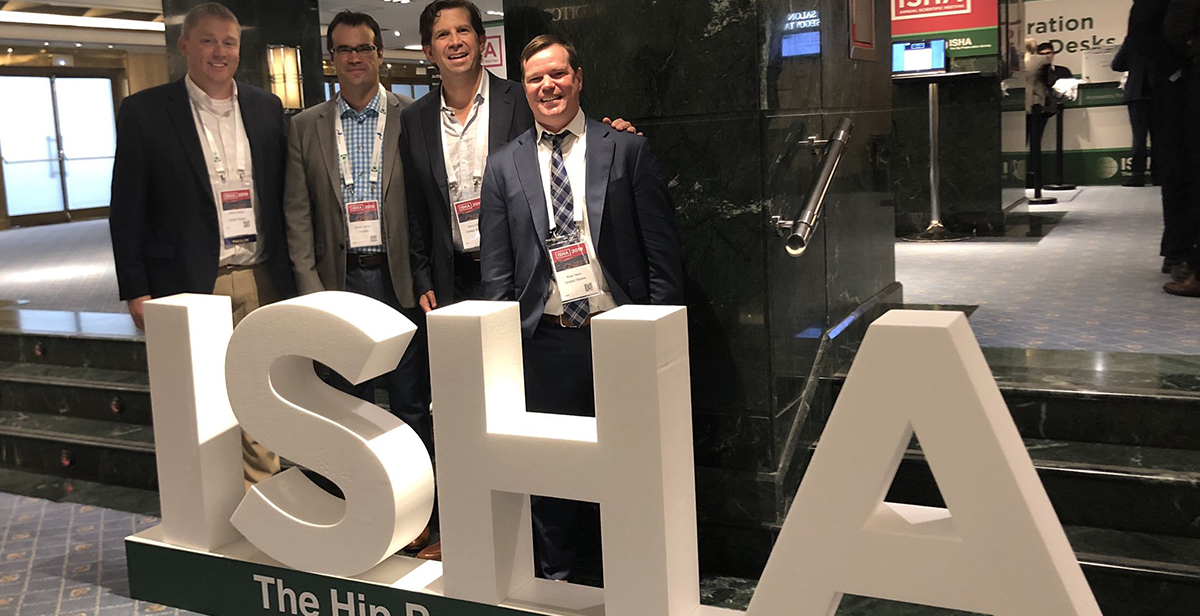 Dr. Henry Ellis with other colleagues at ISHA meeting