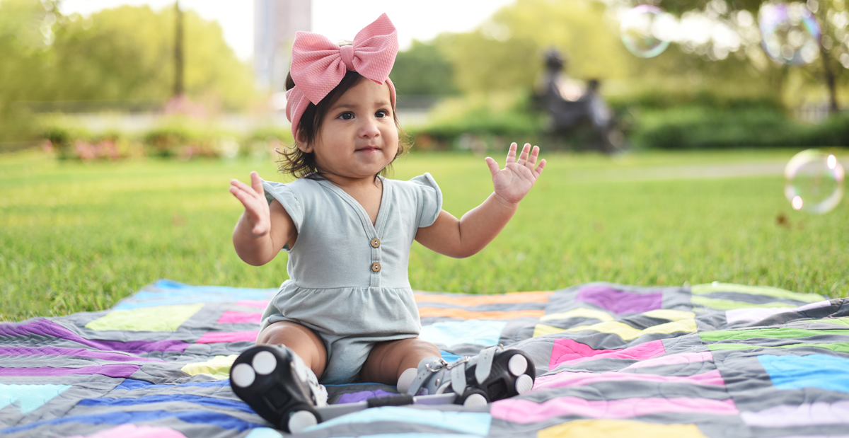 patient playing with bubbles in the park