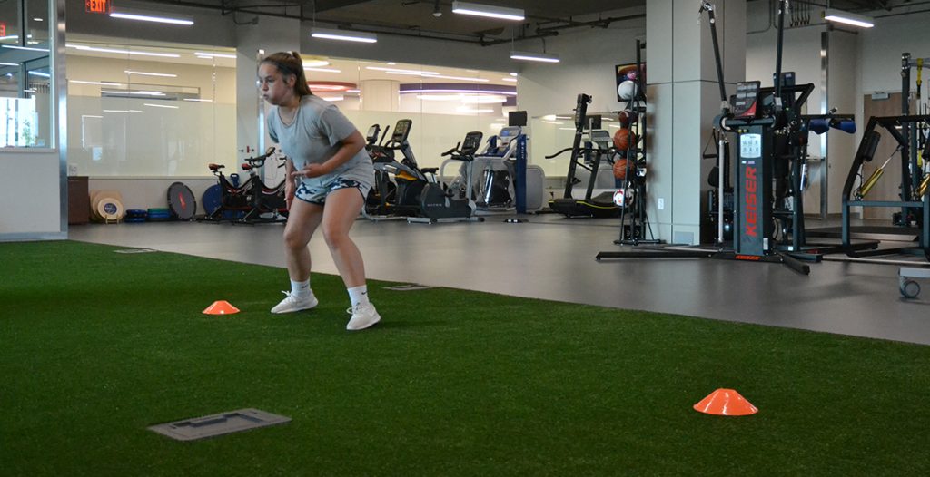 Patient in sports therapy gym in Frisco