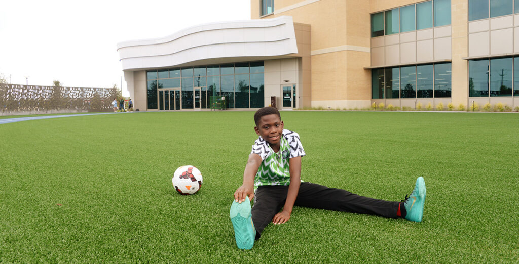 Sports medicine patient stretching at the Frisco campus.