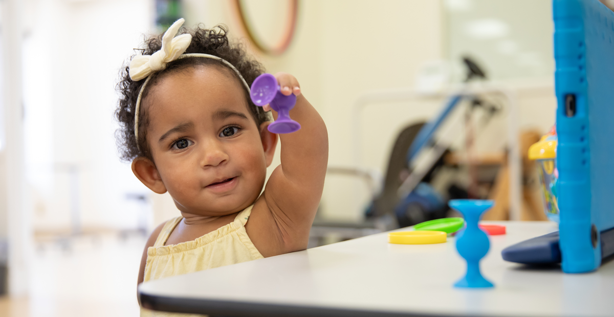 patient playing with toys in physical therapy