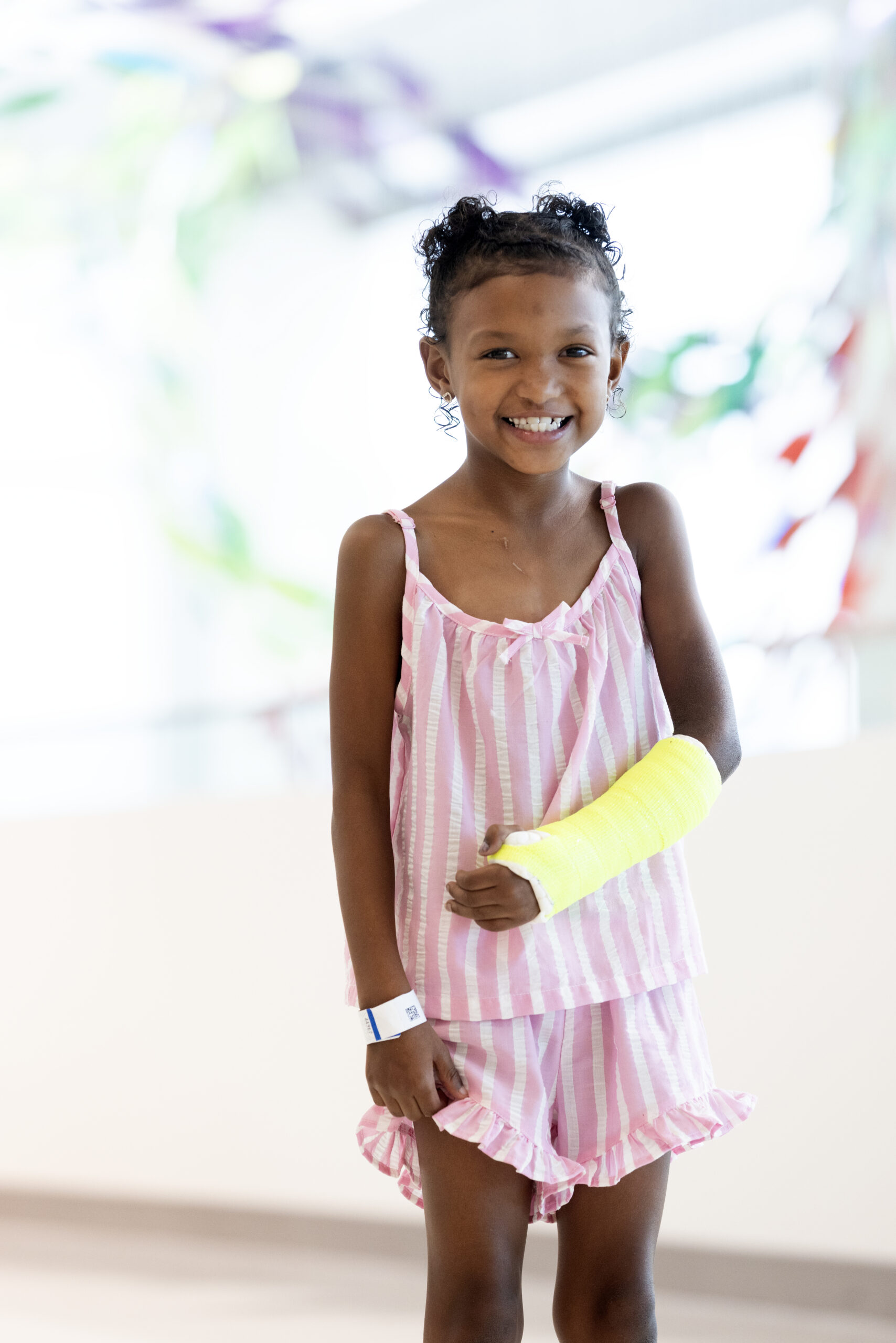 Gabriella Jackson posing with her yellow cast.