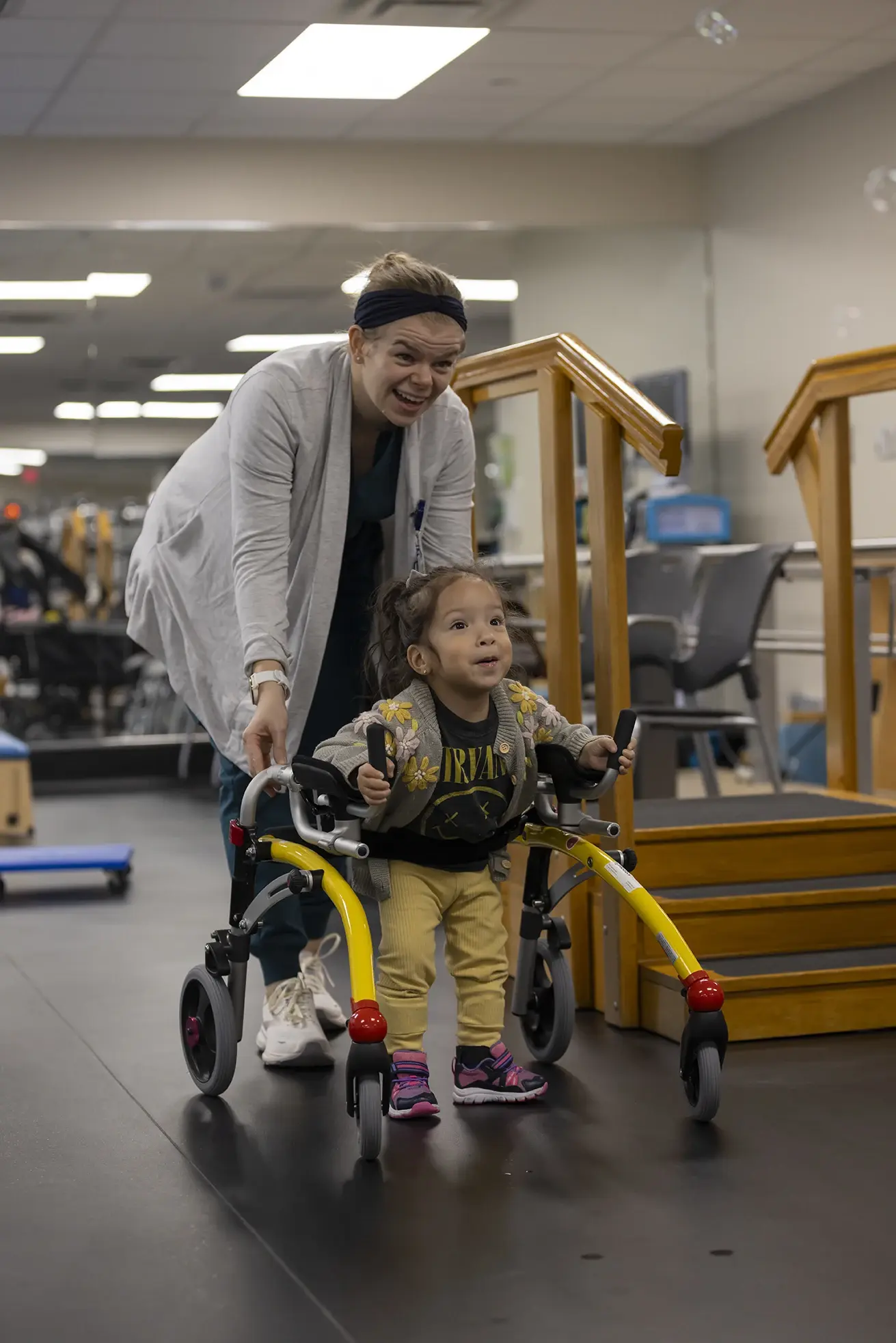 Marley Ruiz working with a physical therapist.