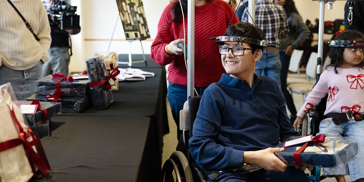 Young boy receiving scoliosis treatment looking off to the side.